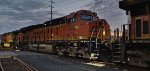 BNSF 3268 waits to detach from the Rear DPU Before reversing into pickup Her Empty Grain Train Cars